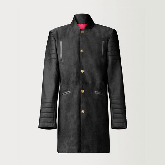 A Beautiful Black Suede Trench Coat, created by designer brand PRSVR. The PRSVR Lab Coat has a suede Body, and lambskin leather sleeves that show off a padded ribbed design on the shoulder and wrist of the sleeve. 