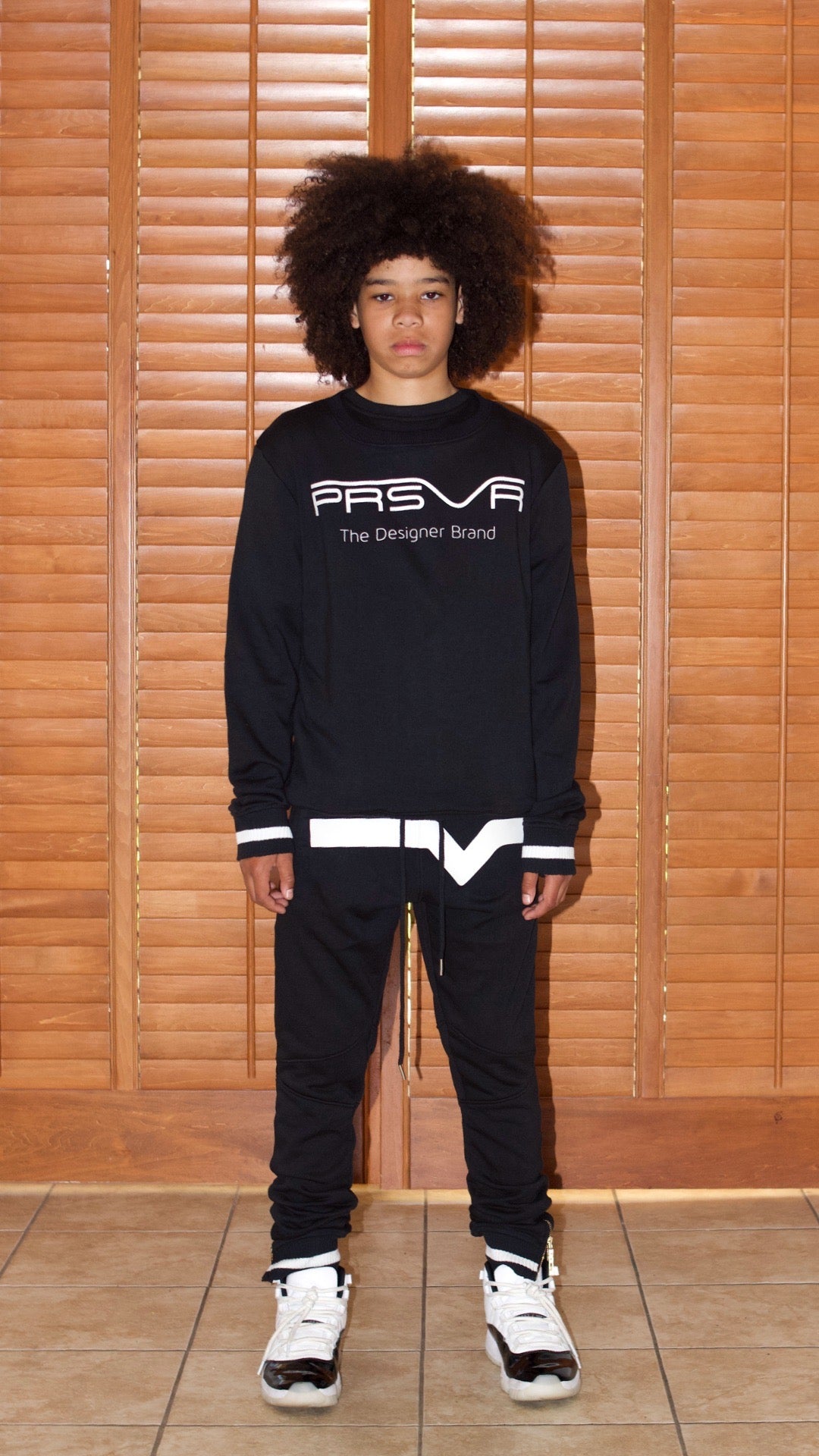 blk and wht sweatsuit PRSVR